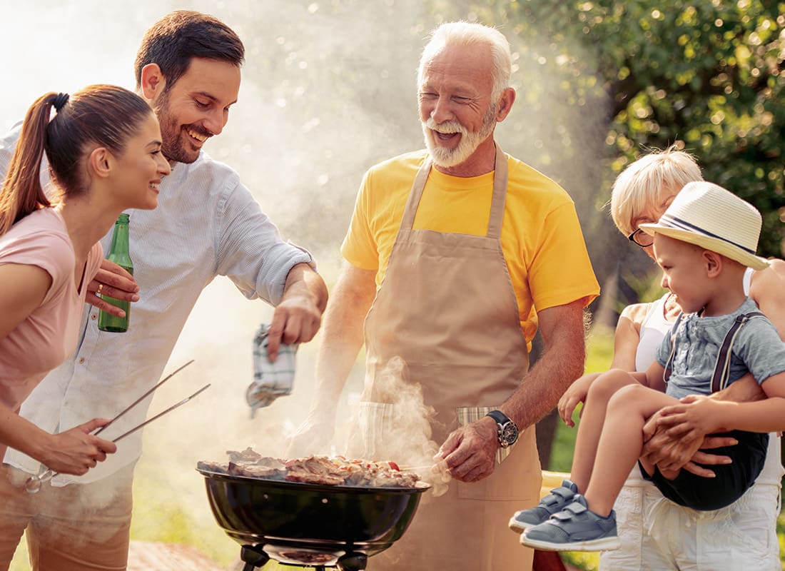 Personal Insurance - Happy Family Have a Cookout Together on a Sunny Day